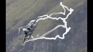 USAF New F-35s v Old F15s through the Mach Loop Wales Spectacular contrails & fluff!!