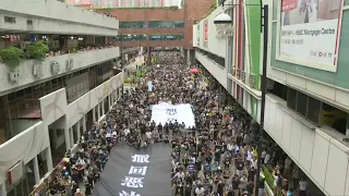 Hong Kong protests: Huge crowds march in Sha Tin suburb | AFP