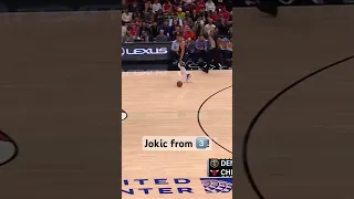 Nikola Jokic casually lets the ball roll to half court & drills the 3! 🎯 | #Shorts