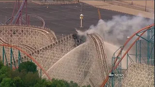 Six Flags roller coaster catches fire, collapses