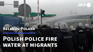 Water cannons fired towards migrants stuck on Poland-Belarus border | AFP