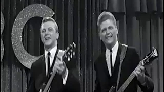 CARROLL Brothers. sing "Hey! Bo Diddley'. 1962. Lang Jeffries.