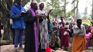 Fr.Nsubuga John Baptista leads a Marian hymn together with Christians at Shrine of Mary Iceme