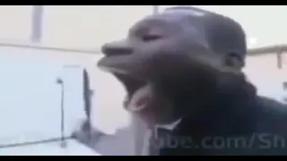 black man screaming alarm