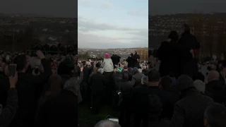 Christy Moore sings at the grave of Martin McGuinness