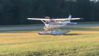 Cessna 182 Seaplane landing on Grass