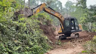 Excavating Remote Mountain Gravelly Road for Passing Vehicles Easily