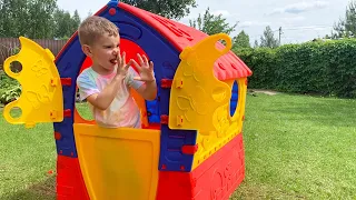Funny baby Super Lev builds and play with Colored House and his Brother Gleb prevents him