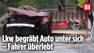 Lkw zerquetscht Auto: Fahrer befreit sich nach Horror-Unfall selbst