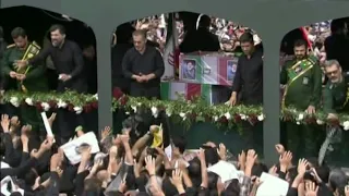 Iranians bid farewell to President Raisi in his hometown ahead of burial | AFP