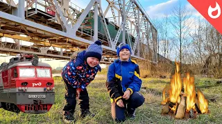 Freight trains and picnic / railway bridge and river flood