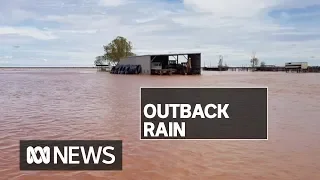 Trucks stranded, roads cut as widespread rain prompts flood warnings for Queensland | ABC News