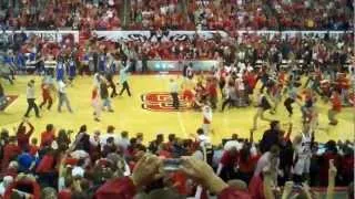 N.C. State fans rush the court after beating #1 Duke