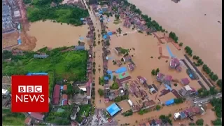 China floods: Dozens killed, more than a million evacuated - BBC News