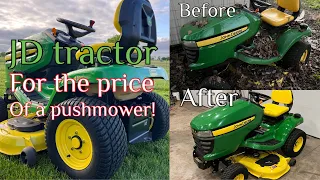 Restoration of a cheap John Deere tractor. It turned out better than I expected!