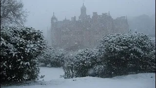 Walking up a snowy mountain towards a large castle a Playlist