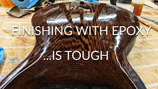 Sanding back, staining, and finishing a carved guitar with epoxy... is tough