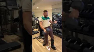 Conor McGregor fully pumped in the gym with a broken leg....