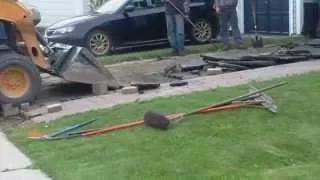 Removal of old asphalt on residential driveway I