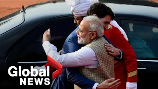 India's Modi bear hugs Justin Trudeau after dinner-invite controversy