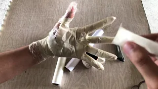 How to Make a Cast of Your Hand Using Masking Tape, Cling Wrap, and Newspaper