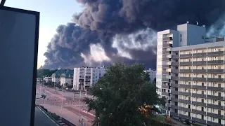Dark Smoke Shrouds Warsaw as Fire Engulfs Mall