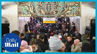Russia missile attack: Kyiv residents take shelter in subway tunnels