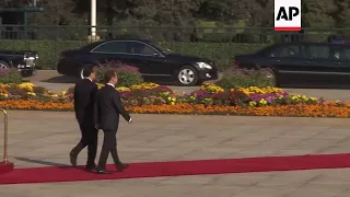 China Premier Li welcomes Russia's Medvedev in Beijing