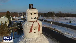 Family builds more than 40 foot tall, super-sized snowman in Milltown, Wis. | FOX 9 KMSP