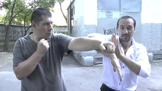 Wing Chun. Yuri Kormushin on the block of Bon Sao