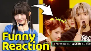 IVE Rei funny reaction and hiding behind NCT Taeyong during the Music Bank