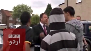 Asian men and BNP candidate Bob Bailey fist fight.