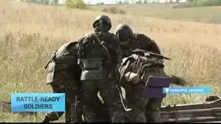 Battle-Ready Soldiers: Ukrainian troops stand on guard near Mariupol in spite of lull in fighting