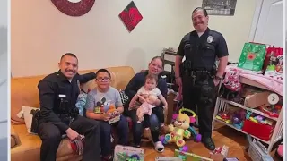 LA police officers save Christmas for family who lost toys in car fire