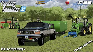 Wrapping & transporting BIG round GRASS SILAGE bales | Elmcreek | Farming Simulator 22 | Episode 22