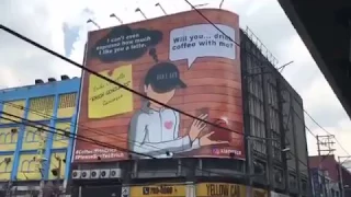 Guy pays for a billboard to ask Erich Gonzales to drink coffee with him!