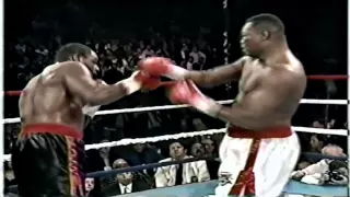 Oliver McCall vs Larry Holmes (highlights)