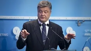 Порошенко верит в реализацию минского протокола до конца 2015 г.