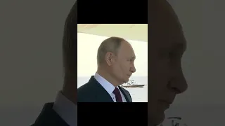 Putin silents a woman during national anthem