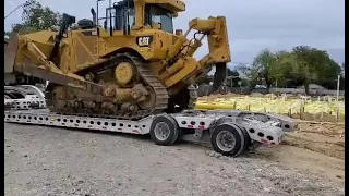 Unloading a caterpillar D8T bulldozer off the back of our rackley bilt 5axle trailer (video #6)