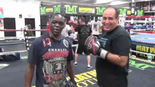 Jeff Mayweather teaches a gym visitor how to box