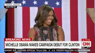 Ouch: Crowd chants "Four More Years" for Barack and Michelle Obama at rally for Hillary Clinton