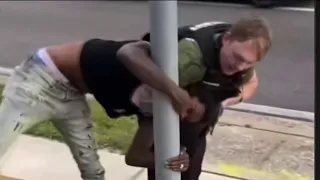 Orange County Sheriff reviewing video where officer puts arm around suspect's neck