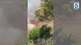 Brush fire burns near homes in Laguna Niguel