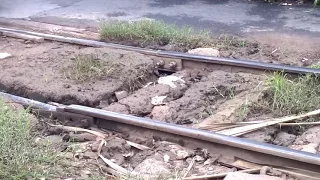 Shocking! Train passing over a broken rail/track