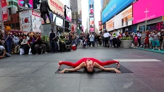 Nina Burri performs Contortion Act - Imagine - on Times Square in NYC