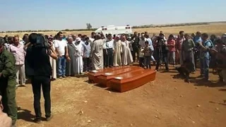 Syria: Father buries drowned boys, wife in hometown Kobane