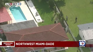 Suspect jumps in canal during police pursuit in northwest Miami-Dade