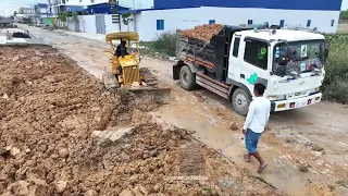 Best Amazing Mighty KOMATSU D20P Pushing Mud Landfill with 5 Ton Truck Unloading