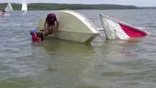 Capsize recovery of a Sunfish by a 7-year-old (second attempt)